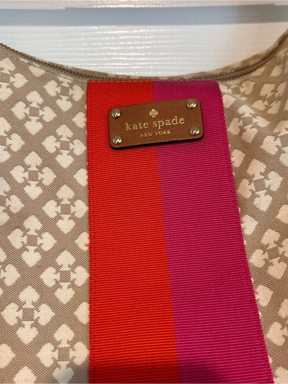 Kate Spade “Mona” Beige Patterned Hobo with Pink and Red Stripe